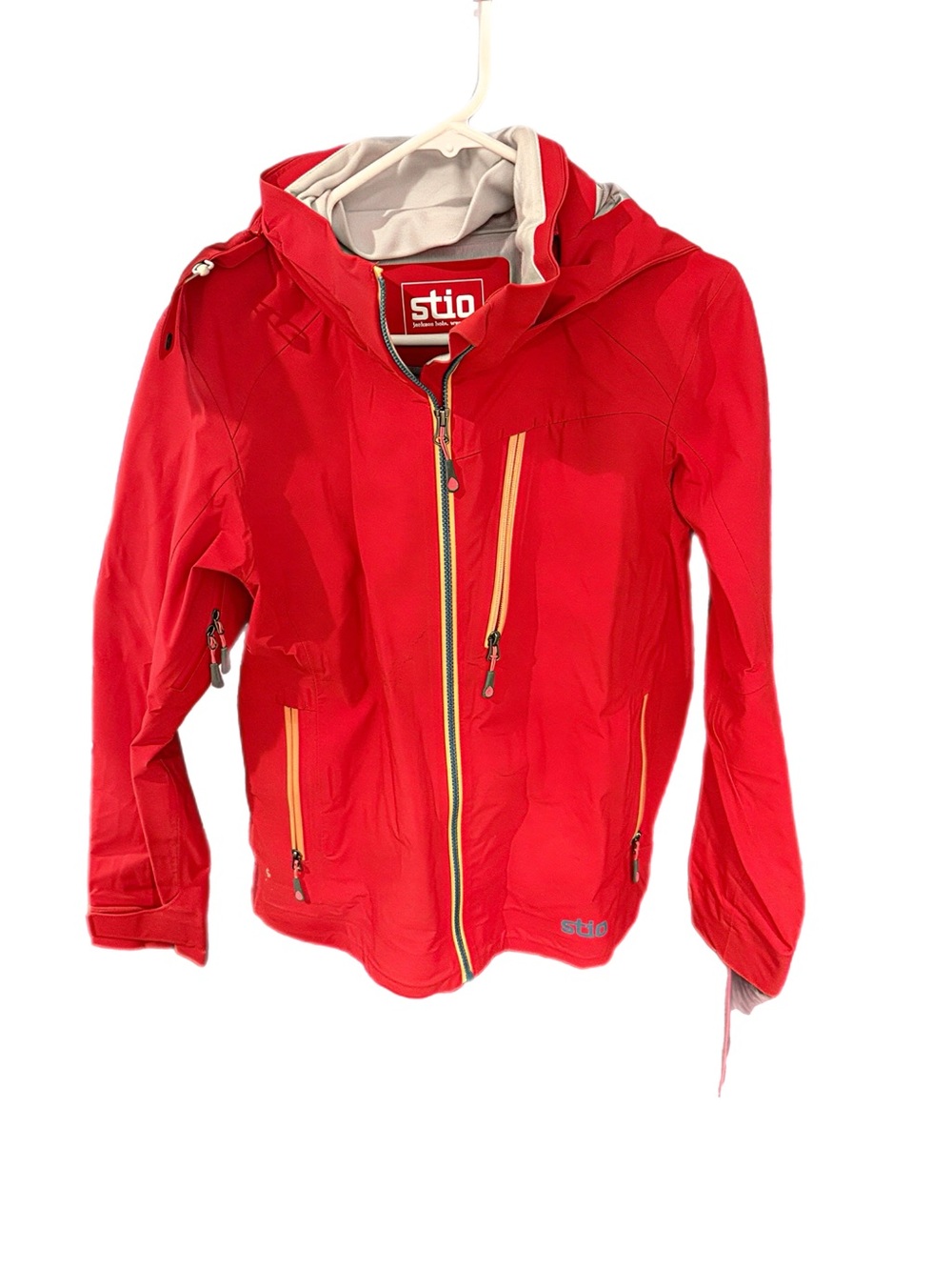 Stio Bright Red Ski Jacket with Yellow Zip Accents